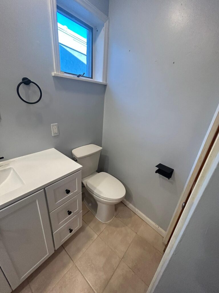 sink, tile installation and wall paint